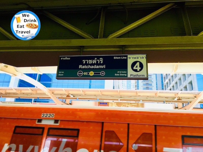 Ratchadamri BTS station sign for Silom Line at the train station showing Platform 4 for Ratchadamri as a key stop to getting to Platinum Fashion Mall in Bangkok.