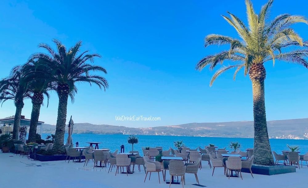 One of the top things to do in Tivat Montenegro is dine at Al fresco waterfront restaurants and cafes with stunning views of the landscape and turquoise water.